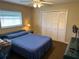 Bedroom with double bed and built-in closet at 872 Dobell Nw Ter, Port Charlotte, FL 33948
