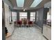 Kitchen with ample cabinetry, breakfast nook, and skylights at 872 Dobell Nw Ter, Port Charlotte, FL 33948