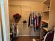 Large walk-in closet with shelving and hanging rods at 872 Dobell Nw Ter, Port Charlotte, FL 33948