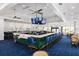 Upscale community bar with stylish seating and multiple screens at 10958 Trevino St, Englewood, FL 34223