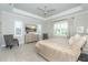 Bright bedroom featuring a king bed and stylish decor at 10958 Trevino St, Englewood, FL 34223