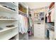 Large walk-in closet with ample shelving and hanging space at 10958 Trevino St, Englewood, FL 34223