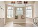Beautifully tiled bathroom with glass block windows providing natural light to the shower area at 110 Barracuda Dr, Placida, FL 33946