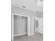 Bedroom with a closet and luxury vinyl plank flooring at 119 White Pine Dr, Rotonda West, FL 33947