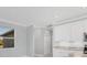 Bright kitchen with white cabinets, granite counters, and stainless steel appliances at 119 White Pine Dr, Rotonda West, FL 33947