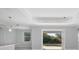 Living Room featuring an open patio, a ceiling with recessed lights, and gray walls at 119 White Pine Dr, Rotonda West, FL 33947