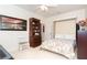 Guest bedroom with a comfortable murphy bed and built-in shelves at 13307 Eisenhower Dr, Port Charlotte, FL 33953