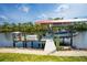 Well-equipped boat dock featuring a boat lift and ample space for docking, set along a serene waterway with lush surroundings at 13307 Eisenhower Dr, Port Charlotte, FL 33953