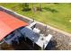 Aerial shot of a covered boat dock with a well-maintained platform, providing a private waterfront oasis and boat access at 13307 Eisenhower Dr, Port Charlotte, FL 33953