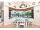 Charming breakfast nook with built in seating and pool views at 13307 Eisenhower Dr, Port Charlotte, FL 33953