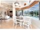 Bright breakfast nook with pool view, perfect for morning coffee at 13307 Eisenhower Dr, Port Charlotte, FL 33953