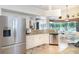 Spacious kitchen featuring stainless steel appliances and granite countertops at 13307 Eisenhower Dr, Port Charlotte, FL 33953