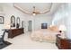 Bright main bedroom with king bed and ample closet space at 13307 Eisenhower Dr, Port Charlotte, FL 33953
