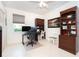 Home office with dual workstations and built-in shelving at 13307 Eisenhower Dr, Port Charlotte, FL 33953