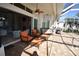 Relaxing pool area with patio furniture and screened enclosure at 13307 Eisenhower Dr, Port Charlotte, FL 33953
