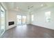 Bright open bedroom featuring waterfront views, a tray ceiling, and modern finishes at 159 Colony Point Dr, Punta Gorda, FL 33950
