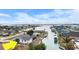 Aerial view of the home and neighborhood, highlighting canal access and surrounding residential area at 1954 Arkansas Ave, Englewood, FL 34224