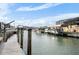 Scenic view down canal featuring multiple docks and boat lifts at 1954 Arkansas Ave, Englewood, FL 34224