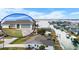 Waterfront home featuring lush lawn, canal access and beautiful water views at 1954 Arkansas Ave, Englewood, FL 34224