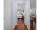 Hallway with wood floors leading to the main bedroom at 1954 Arkansas Ave, Englewood, FL 34224