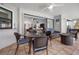 Covered lanai with comfortable seating and views of the interior of the house at 1954 Arkansas Ave, Englewood, FL 34224