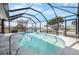 Beautiful screened pool with lovely views of canal at 1954 Arkansas Ave, Englewood, FL 34224