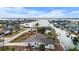 Aerial view of a waterfront home with easy access to the Intracoastal Waterway and Gulf of Mexico at 1954 Arkansas Ave, Englewood, FL 34224