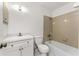 Functional bathroom featuring a tub shower and vanity sink with cabinetry at 7330 Regina Dr, Englewood, FL 34224