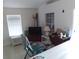 Bright living room with natural light, showcasing neutral tones and inviting decor for comfortable living at 91 Gasparilla Way, Placida, FL 33946