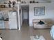 Open-concept space showcasing a combined kitchen and living area, creating an inviting atmosphere at 91 Gasparilla Way, Placida, FL 33946