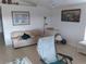 Cozy living room featuring comfortable seating and coastal-inspired decor, creating a relaxing retreat at 91 Gasparilla Way, Placida, FL 33946