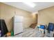 Functional basement area with storage solutions and stairs to upper level at 9240 Pine Cove Dr, Englewood, FL 34224