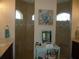 Elegant main bathroom featuring dual walk-in showers, decorative mirrors, and modern fixtures at 380 Hoffer St, Port Charlotte, FL 33953