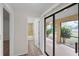 Hallway leading to the bathroom and screened-in porch at 3568 Middletown St, Port Charlotte, FL 33952