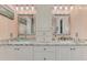 Elegant bathroom with double sinks, granite countertop, and modern fixtures at 5231 Conner Ter, Port Charlotte, FL 33981