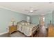 Comfortable bedroom with hardwood floors, neutral walls, and ample natural light at 5231 Conner Ter, Port Charlotte, FL 33981