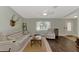 Cozy living room with stylish furnishings, hardwood floors, and lots of natural light at 5231 Conner Ter, Port Charlotte, FL 33981