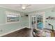 Cozy office space with views of the pool through sliding glass doors at 5231 Conner Ter, Port Charlotte, FL 33981