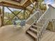 Unique outdoor deck and viewing area with wood beams and structural elements for outdoor living at 7475 Manasota Key Rd, Englewood, FL 34223