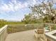 Cozy deck area furnished with chairs offering serene outdoor views at 7475 Manasota Key Rd, Englewood, FL 34223