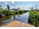 Picturesque canal view from the dock showcasing calm waters and green vegetation at 914 E 2Nd St, Englewood, FL 34223