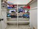 Walk-in closet with shelving and stored items at 914 E 2Nd St, Englewood, FL 34223
