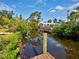 Canal view from the dock featuring waterfront properties and lush surroundings at 914 E 2Nd St, Englewood, FL 34223