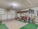 Spacious garage with an automatic door and ample storage for tools and equipment at 914 E 2Nd St, Englewood, FL 34223