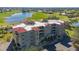 Aerial shot showing the condo complex and the surrounding lush golf course and waterways at 10045 Links Ln # 203, Rotonda West, FL 33947