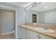 Bathroom features a double sink vanity with ample counter space and cabinetry at 10045 Links Ln # 203, Rotonda West, FL 33947