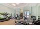 Community gym featuring modern exercise equipment and ample natural light at 10045 Links Ln # 203, Rotonda West, FL 33947