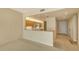 Open floor plan with view to kitchen and entry at 10045 Links Ln # 203, Rotonda West, FL 33947