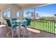 Lanai featuring comfortable seating and lovely view of the well-manicured lawn and tropical plants at 11200 Hacienda Del Mar Blvd # 201, Placida, FL 33946