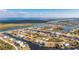 Beautiful aerial view of waterfront homes with boat access in a scenic coastal community at 15626 Meacham Cir, Port Charlotte, FL 33981